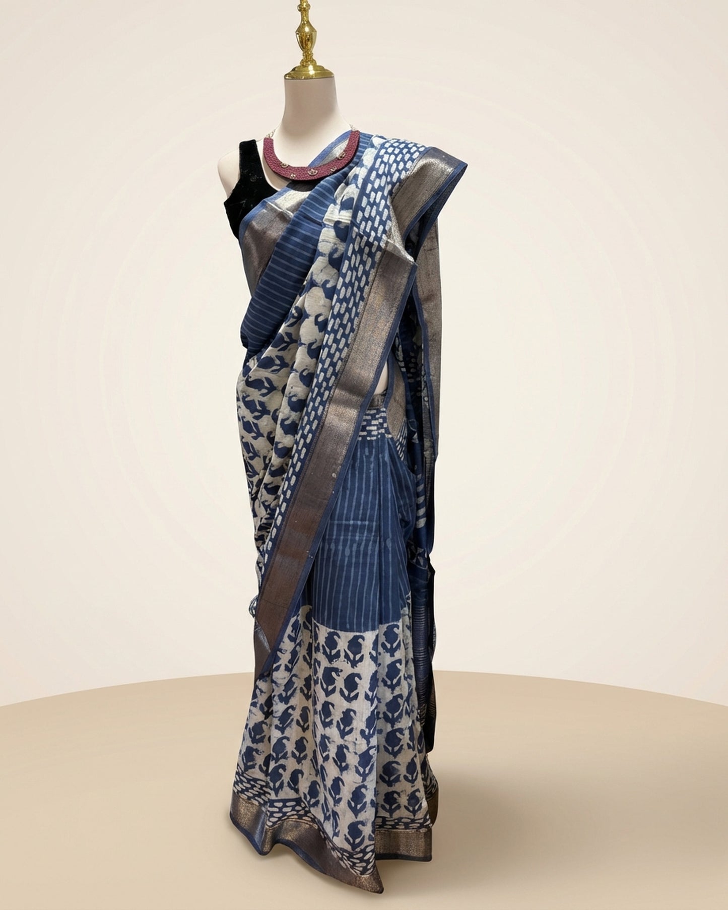 Hand block Batik Blue Maheshwari Silk Saree with silver zari border.