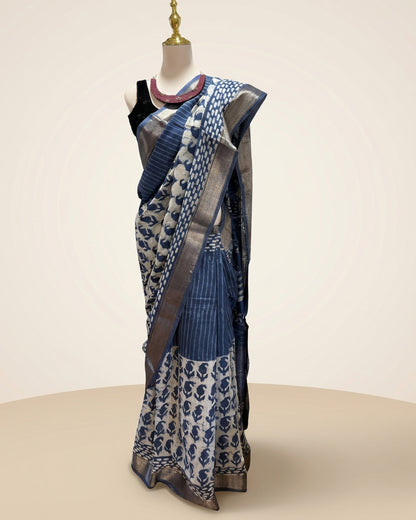 Hand block Batik Blue Maheshwari Silk Saree with silver zari border.
