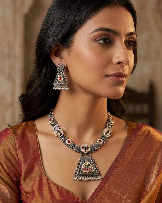 The woman wearing the jewelry is AI generated for representation purposes.