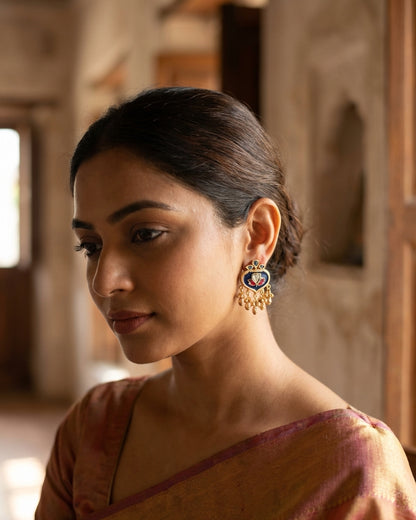 The woman wearing the jewelry is AI generated for representation purposes.