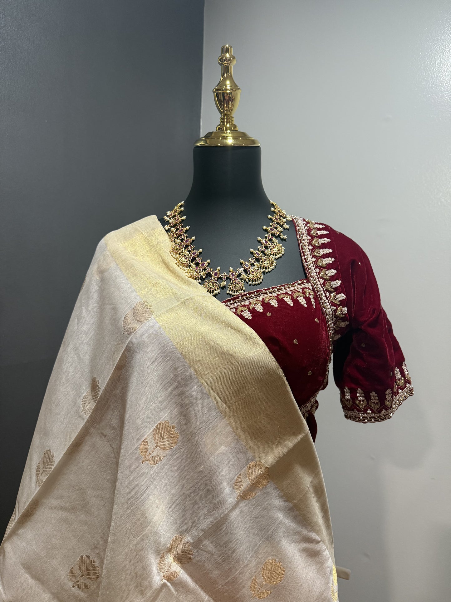White-Gold Chanderi Silk saree with golden tissue border and floral buttas.