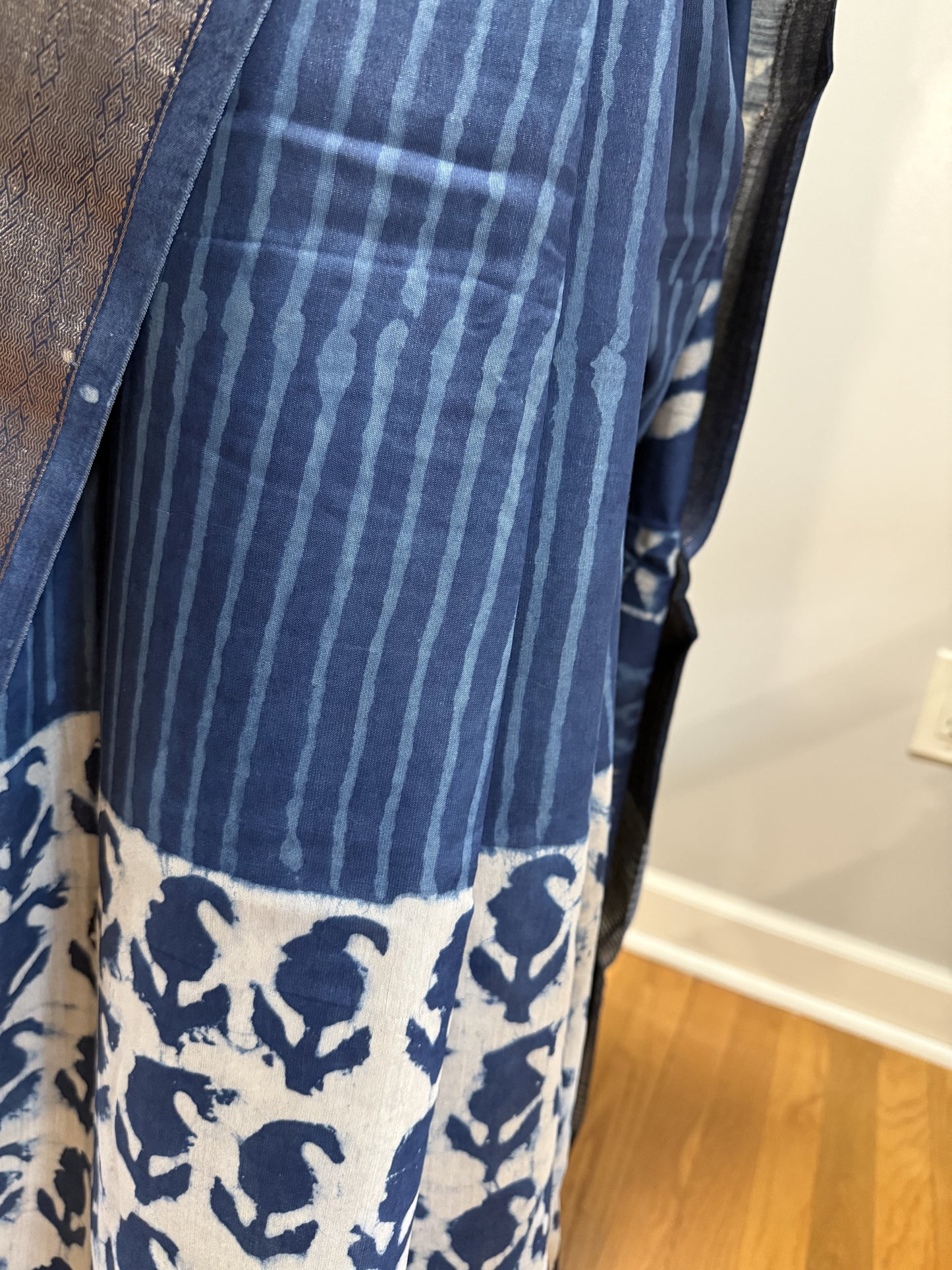 Hand block Batik Blue Maheshwari Silk Saree with silver zari border.