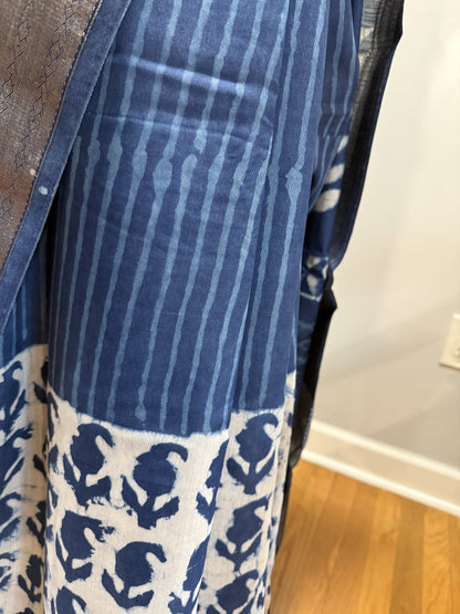 Hand block Batik Blue Maheshwari Silk Saree with silver zari border.