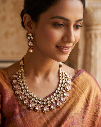 The woman wearing the jewelry is AI generated for representation purposes.