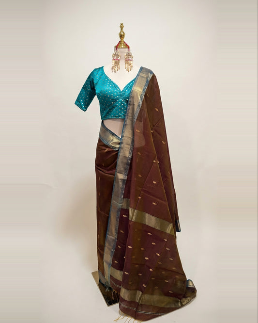 Handwoven Maheshwari silk cotton saree in coffee color and teal border.