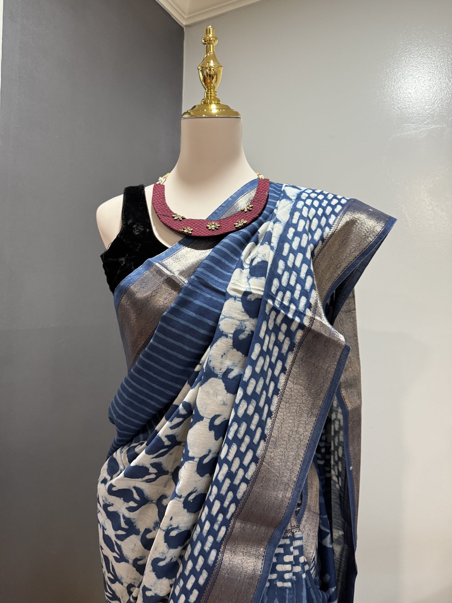 Hand block Batik Blue Maheshwari Silk Saree with silver zari border.